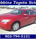 toyota camry 2009 red sedan le gasoline 4 cylinders front wheel drive automatic 75503
