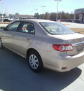 toyota corolla 2011 tan sedan le gasoline 4 cylinders front wheel drive automatic 75503