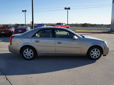 cadillac cts 2005 gold sedan gasoline 6 cylinders rear wheel drive automatic 76087