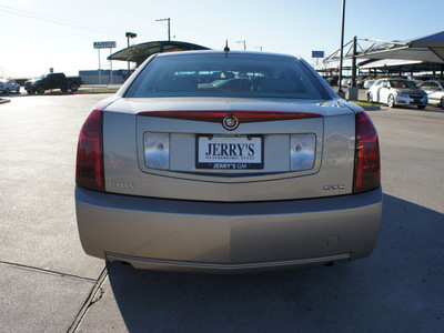 cadillac cts 2005 gold sedan gasoline 6 cylinders rear wheel drive automatic 76087