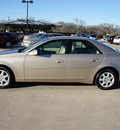 cadillac cts 2005 gold sedan gasoline 6 cylinders rear wheel drive automatic 76087