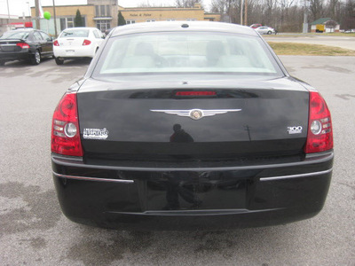 chrysler 300 2009 black sedan touring gasoline 6 cylinders rear wheel drive automatic 62863
