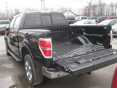 ford f 150 2012 black lariat gasoline 6 cylinders 4 wheel drive 6 speed automatic 62863