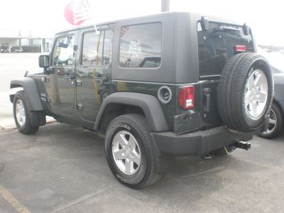 jeep wrangler unlimited 2010 green suv sport gasoline 6 cylinders 4 wheel drive automatic 13502