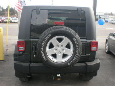 jeep wrangler unlimited 2010 green suv sport gasoline 6 cylinders 4 wheel drive automatic 13502