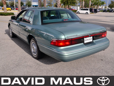mercury grand marquis 1997 green sedan gs gasoline v8 rear wheel drive automatic 32771