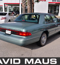 mercury grand marquis 1997 green sedan gs gasoline v8 rear wheel drive automatic 32771