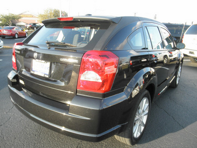 dodge caliber 2011 black hatchback heat gasoline 4 cylinders front wheel drive automatic 34474