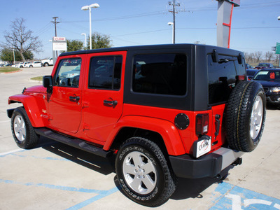 jeep wrangler unlimited 2011 red suv sahara gasoline 6 cylinders 4 wheel drive automatic 76210