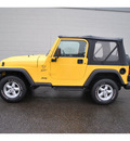 jeep wrangler 2001 yellow suv sport gasoline 6 cylinders 4 wheel drive automatic 98371