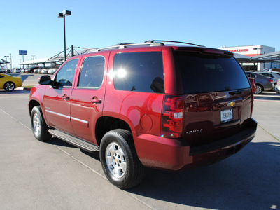 chevrolet tahoe 2011 red suv lt flex fuel 8 cylinders 4 wheel drive automatic 76087