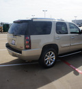 gmc yukon 2007 gold suv denali gasoline 8 cylinders all whee drive automatic 76108