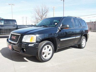 gmc envoy 2003 black suv slt gasoline 6 cylinders 4 wheel drive automatic 80301