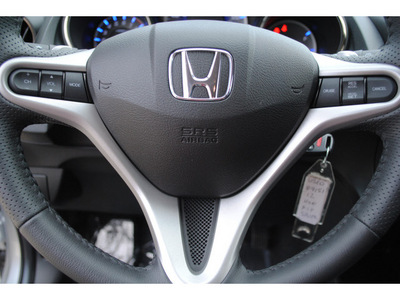 honda fit 2012 silver hatchback sport gasoline 4 cylinders front wheel drive automatic 77065