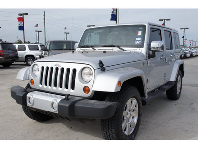 jeep wrangler unlimited 2012 silver suv sahara gasoline 6 cylinders 4 wheel drive automatic 77090