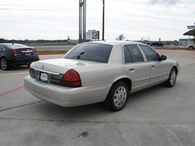 mercury grand marquis 2006 gold sedan gs flex fuel 8 cylinders rear wheel drive automatic with overdrive 76087