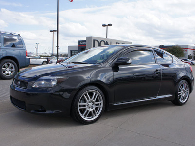 scion tc 2007 black hatchback gasoline 4 cylinders front wheel drive 5 speed manual 76018