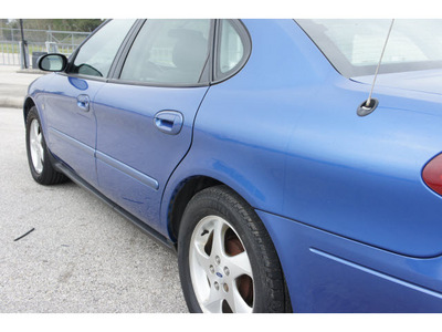 ford taurus 2003 lt  blue sedan ses gasoline 6 cylinders front wheel drive automatic 77388