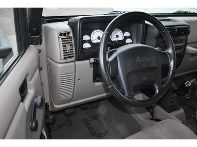 jeep wrangler 2003 khaki suv sport gasoline 6 cylinders 4 wheel drive 5 speed manual 98371