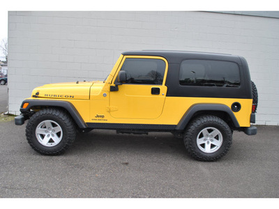 jeep wrangler 2006 yellow suv unlimited rubicon gasoline 6 cylinders 4 wheel drive 6 speed manual 98371
