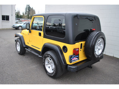 jeep wrangler 2005 yellow suv rubicon gasoline 6 cylinders 4 wheel drive 6 speed manual 98371