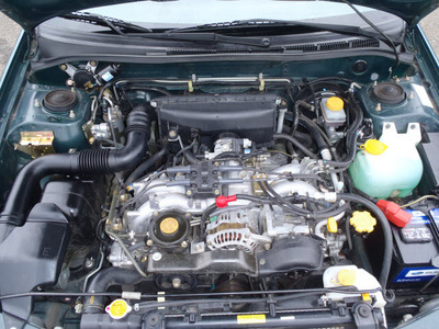 subaru impreza 1999 green wagon outback sport gasoline 4 cylinders all whee drive 4 speed manual 98632