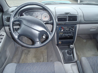 subaru impreza 1999 green wagon outback sport gasoline 4 cylinders all whee drive 4 speed manual 98632