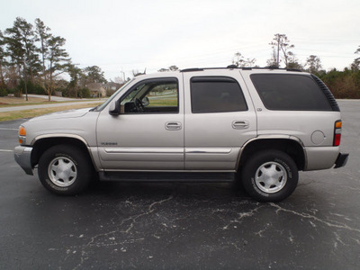 gmc yukon 2004 dk  gray suv slt flex fuel 8 cylinders 4 wheel drive automatic with overdrive 28557