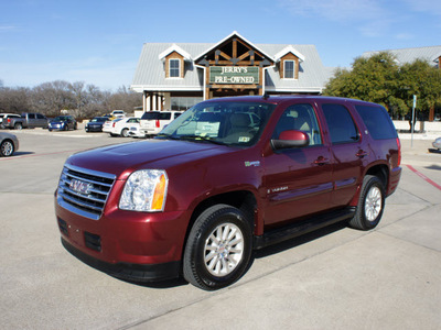 gmc yukon 2008 red suv hybrid hybrid 8 cylinders 2 wheel drive automatic 76087