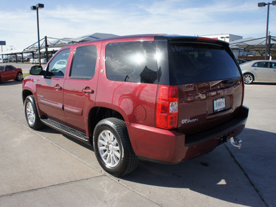 gmc yukon 2008 red suv hybrid hybrid 8 cylinders 2 wheel drive automatic 76087