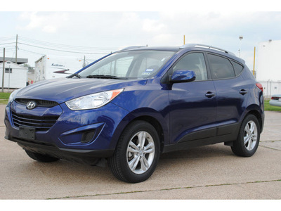 hyundai tucson 2011 lt  blue gls gasoline 4 cylinders front wheel drive automatic 77037