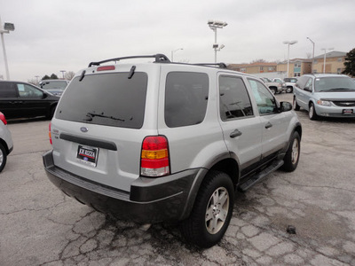ford escape 2004 silver suv xlt gasoline 6 cylinders front wheel drive automatic with overdrive 60546