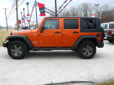 jeep wrangler unlimited 2010 orange suv 4x4 sport gasoline 6 cylinders 4 wheel drive automatic 45840