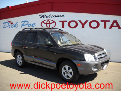 hyundai santa fe 2006 green suv gasoline 6 cylinders all whee drive automatic 79925