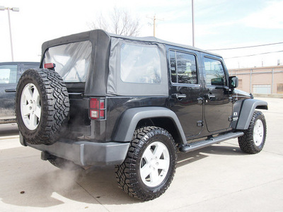 jeep wrangler unlimited 2007 black suv x gasoline 6 cylinders 4 wheel drive 6 speed manual 80301