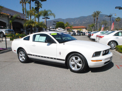 ford mustang 2007 white coupe v6 deluxe gasoline 6 cylinders rear wheel drive automatic 91010