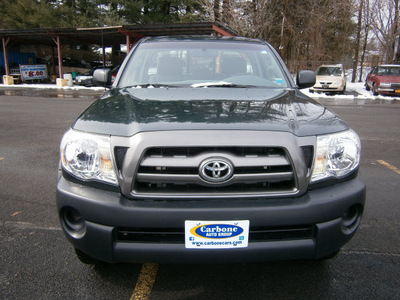 toyota tacoma 2010 green gasoline 4 cylinders 4 wheel drive 5 speed manual 13502
