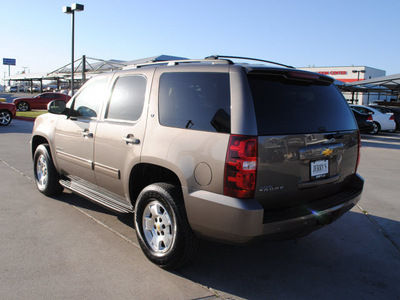 chevrolet tahoe 2011 brown suv lt 8 cylinders automatic 76087