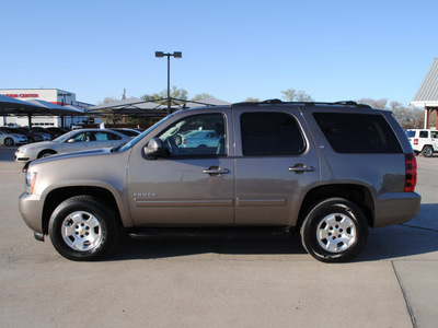 chevrolet tahoe 2011 brown suv lt 8 cylinders automatic 76087