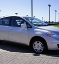nissan versa 2011 silver hatchback gasoline 4 cylinders front wheel drive automatic with overdrive 76018