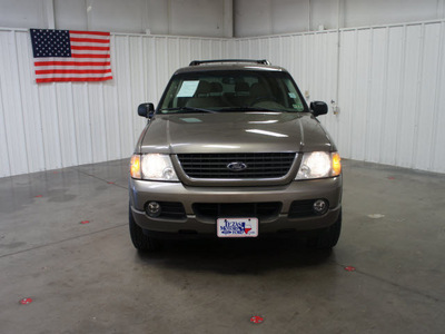 ford explorer 2002 gold suv xlt flex fuel 6 cylinders rear wheel drive automatic with overdrive 76108
