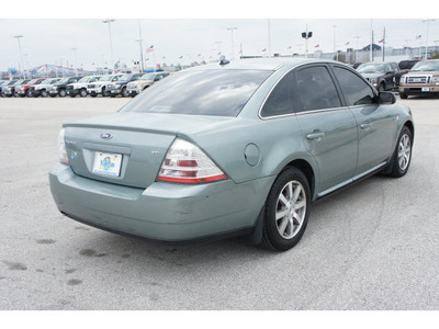 ford taurus 2008 green sedan sel 6 cylinders automatic 77388