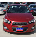 chevrolet sonic 2012 red gasoline 4 cylinders front wheel drive 6 spd auto connivity plus 77090