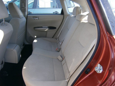 subaru impreza 2009 red hatchback 2 5i 4 cylinders 5 speed manual 13502