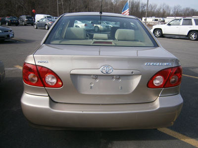 toyota corolla 2007 gold sedan 4 cylinders automatic with overdrive 13502