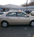 toyota corolla 2007 gold sedan 4 cylinders automatic with overdrive 13502