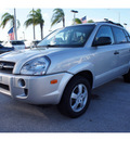 hyundai tucson 2005 silver suv gl gasoline 4 cylinders front wheel drive 5 speed manual 33157