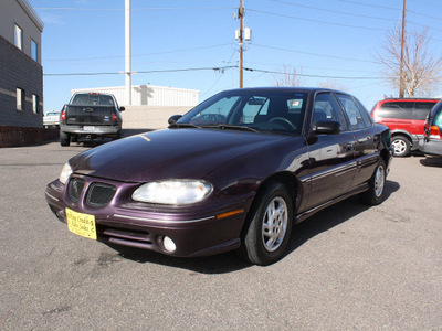 pontiac grand am 1997 purple sedan se 4 cylinders automatic 80229