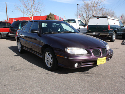 pontiac grand am 1997 purple sedan se 4 cylinders automatic 80229