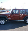 jeep wrangler unlimited 2009 red suv x gasoline 6 cylinders 4 wheel drive 6 speed manual 13502